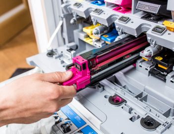 What are the advantages of a laser printer and an ink printer?